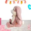 peluche rose lapin vu de profil